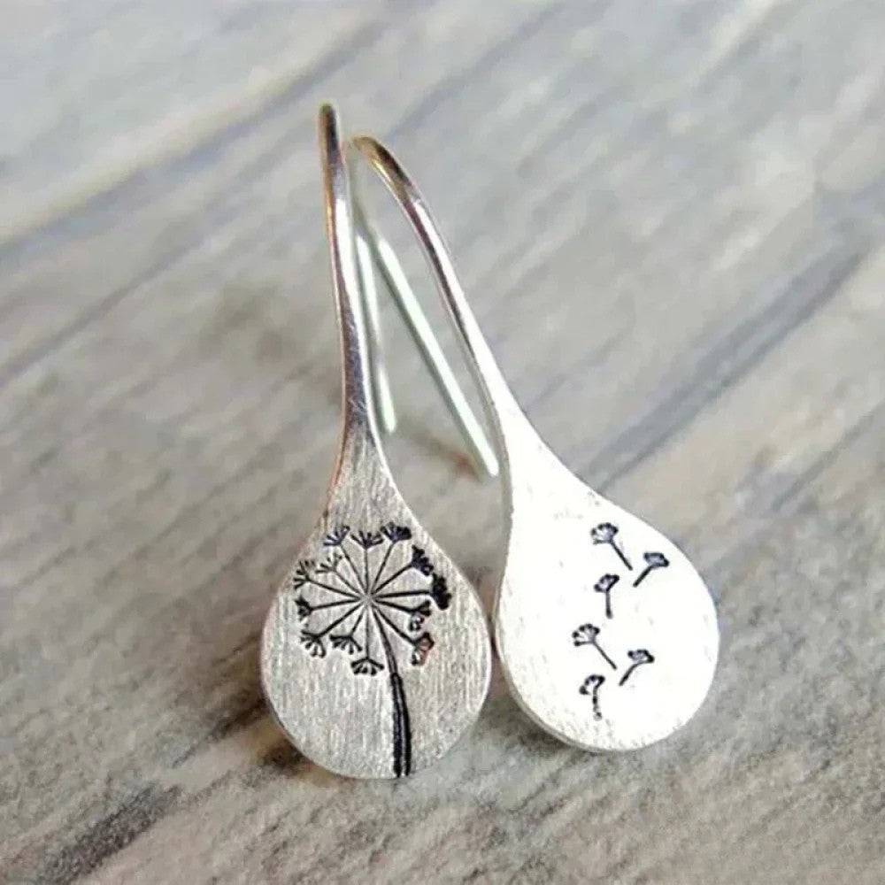 Boucles d'oreilles élégantes en argent au design feuille de pissenlit